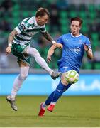27 June 2025; Danny Grant of Shamrock Rovers in action against Sam Glenfield of Waterford during the SSE Airtricity Men's Premier Division match between Shamrock Rovers and Waterford at Tallaght Stadium in Dublin. Photo by Thomas Flinkow/Sportsfile
