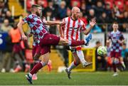 27 June 2025; Conor Keeley of Drogheda United in action against Liam Boyce of Derry City during the SSE Airtricity Men's Premier Division match between Derry City and Drogheda United at The Ryan McBride Brandywell Stadium in Derry. Photo by Shauna Clinton/Sportsfile