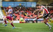 27 June 2025; Michael Duffy of Derry City has a shot on goal during the SSE Airtricity Men's Premier Division match between Derry City and Drogheda United at The Ryan McBride Brandywell Stadium in Derry. Photo by Shauna Clinton/Sportsfile