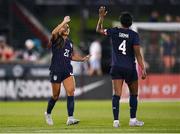 26 June 2025; Alyssa Thompson, left, is congratulated by his United States team-mate Naomi Girma after scoring their side's fourth goal during the women's international friendly match between the USA and Republic of Ireland at Dick’s Sporting Goods Park in Commerce City, Colorado, USA. Photo by Stephen McCarthy/Sportsfile