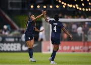 26 June 2025; Alyssa Thompson, left, is congratulated by his United States team-mate Naomi Girma after scoring their side's fourth goal during the women's international friendly match between the USA and Republic of Ireland at Dick’s Sporting Goods Park in Commerce City, Colorado, USA. Photo by Stephen McCarthy/Sportsfile