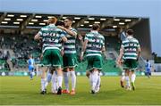 27 June 2025; Rory Gaffney of Shamrock Rovers, 20, celebrates with teammates including Lee Grace, 5, after scoring his side's first goal during the SSE Airtricity Men's Premier Division match between Shamrock Rovers and Waterford at Tallaght Stadium in Dublin. Photo by Thomas Flinkow/Sportsfile