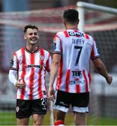 27 June 2025; Danny Mullen of Derry City, left, celebrates with team-mate Michael Duffy after scoring his side's third goal during the SSE Airtricity Men's Premier Division match between Derry City and Drogheda United at The Ryan McBride Brandywell Stadium in Derry. Photo by Shauna Clinton/Sportsfile