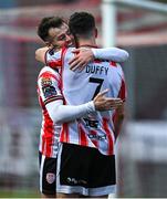 27 June 2025; Danny Mullen of Derry City, left, celebrates with team-mate Michael Duffy after scoring his side's third goal during the SSE Airtricity Men's Premier Division match between Derry City and Drogheda United at The Ryan McBride Brandywell Stadium in Derry. Photo by Shauna Clinton/Sportsfile