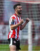 27 June 2025; Michael Duffy of Derry City celebrates his side's third goal, scored by team-mate Danny Mullen, not pictured, during the SSE Airtricity Men's Premier Division match between Derry City and Drogheda United at The Ryan McBride Brandywell Stadium in Derry. Photo by Shauna Clinton/Sportsfile