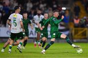 27 June 2025; Chris Forrester of St Patrick's Athletic in action against Charlie Lyons of Cork City during the SSE Airtricity Men's Premier Division match between Cork City and St Patrick's Athletic at Turner's Cross in Cork. Photo by Brendan Moran/Sportsfile