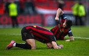 27 June 2025; Bohemians players Dayle Rooney, front, and Dawson Devoy react at the final whistle after the SSE Airtricity Men's Premier Division match between Bohemians and Sligo Rovers at Dalymount Park in Dublin. Photo by Seb Daly/Sportsfile