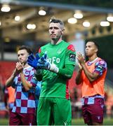 27 June 2025; Drogheda United players, including Luke Dennison, centre, acknowledge supporters after his side's defeat in the SSE Airtricity Men's Premier Division match between Derry City and Drogheda United at The Ryan McBride Brandywell Stadium in Derry. Photo by Shauna Clinton/Sportsfile