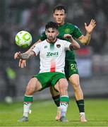 27 June 2025; Sean Maguire of Cork City in action against Axel Sjoberg of St Patrick's Athletic during the SSE Airtricity Men's Premier Division match between Cork City and St Patrick's Athletic at Turner's Cross in Cork. Photo by Brendan Moran/Sportsfile
