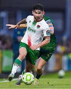 27 June 2025; Sean Maguire of Cork City in action against Joe Redmond of St Patrick's Athletic during the SSE Airtricity Men's Premier Division match between Cork City and St Patrick's Athletic at Turner's Cross in Cork. Photo by Brendan Moran/Sportsfile