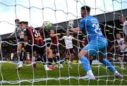 27 June 2025; Sligo Rovers goalkeeper Sam Sargeant concedes a goal in additional time at the end of the second half, scored by James Clarke of Bohemians, hidden, during the SSE Airtricity Men's Premier Division match between Bohemians and Sligo Rovers at Dalymount Park in Dublin. Photo by Seb Daly/Sportsfile