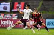 27 June 2025; Jad Hakiki of Sligo Rovers in action against Niall Morahan of Bohemians during the SSE Airtricity Men's Premier Division match between Bohemians and Sligo Rovers at Dalymount Park in Dublin. Photo by Seb Daly/Sportsfile