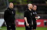 27 June 2025; Bohemians manager Alan Reynolds, left, with assistant manager Stephen O'Donnell, centre, and first team coach Derek Pender, right, during the SSE Airtricity Men's Premier Division match between Bohemians and Sligo Rovers at Dalymount Park in Dublin. Photo by Seb Daly/Sportsfile