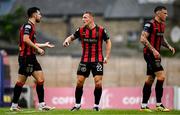 27 June 2025; Bohemians players, from left, Jordan Flores, John Mountney and Rob Cornwall during the SSE Airtricity Men's Premier Division match between Bohemians and Sligo Rovers at Dalymount Park in Dublin. Photo by Seb Daly/Sportsfile