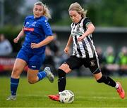 27 June 2025; Charlene Graham of Whitehall Rangers in action against Ella Gleeson of Newbridge Town during the Sports Direct Women's FAI Cup first round match between Newbridge Town and Whitehall at Greenogue Park in Dublin. Photo by Stephen Marken/Sportsfile