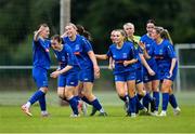 27 June 2025; Newbridge Town players celebrate their side's second goal scored by Rebecca Kavanagh, not shown, during the Sports Direct Women's FAI Cup first round match between Newbridge Town and Whitehall at Greenogue Park in Dublin. Photo by Stephen Marken/Sportsfile
