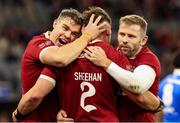 28 June 2025; Dan Sheehan of British & Irish Lions is congratulated by teammates Garry Ringrose, left, and Elliot Daly after scoring their side's first try during the tour match between Western Force and the British & Irish Lions at Optus Stadium in Perth, Australia. Photo by Steve Christo/Sportsfile