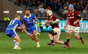 28 June 2025; Mack Hansen of British & Irish Lions, supported by teammate Tadhg Beirne, in action against Dylan Pietsch of Western Force during the tour match between Western Force and the British & Irish Lions at Optus Stadium in Perth, Australia. Photo by Steve Christo/Sportsfile