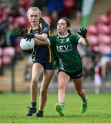 28 June 2025; Olivia Nyhan of Glanmire in action against Seraya Murphy of Charlestown during the LGFA Division 1 match between Glanmire and Charlestown at the John West Féile Peile na nÓg Gaelic Football and LGFA National Finals at Derry GAA Centre of Excellence in Owenbeg, Derry. Photo by Shauna Clinton/Sportsfile