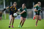 28 June 2025; Emily Crowley of Glanmire in action against Amy Vesey of Charlestown during the LGFA Division 1 match between Glanmire and Charlestown at the John West Féile Peile na nÓg Gaelic Football and LGFA National Finals at Derry GAA Centre of Excellence in Owenbeg, Derry. Photo by Shauna Clinton/Sportsfile