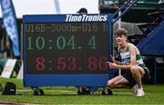 28 June 2025; Ruby Devereaux of Youghal AC, Cork, poses with the timing board after setting a champioship record, with a time of 8:53.86, after winning the Boys Under 16 3000m during day one of the 123.ie National Juveniles Track & Field Championships at Tullamore Harriers Athletics Club in Offaly. Photo by Ben McShane/Sportsfile