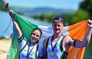 28 June 2025; Sadhbh Ní Laoghaire, left, and Tiarnán O'Donnell of Ireland with their bronze medals after the PR3 Mixed Double Sculls Final during the 2025 World Rowing Cup at Rotsee in Lucerne, Switzerland. Photo by Benedict Tufnell/Sportsfile