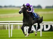 28 June 2025; Dorset, with Ryan Moore up, on their way to winning the Barronstown Stud Irish EBF Maiden during day two of the Dubai Duty Free Irish Derby Festival at The Curragh Racecourse in Kildare. Photo by Seb Daly/Sportsfile