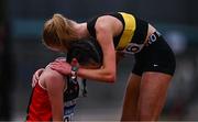 28 June 2025; Abby Smith of Shercock AC, Cavan, left, is consoled by Emma Stewart of Dromore AC, Down, after the Girls Under 17 3000m during day one of the 123.ie National Juveniles Track & Field Championships at Tullamore Harriers Athletics Club in Offaly. Photo by Ben McShane/Sportsfile