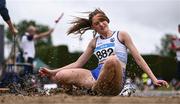 28 June 2025; Ava Barry of Kilmore AC, Wexford, competes in the Girls Under 18 Triple Jump during day one of the 123.ie National Juveniles Track & Field Championships at Tullamore Harriers Athletics Club in Offaly. Photo by Ben McShane/Sportsfile