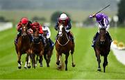 28 June 2025; Beautify, right, with Ryan Moore up, on their way to winning the Airlie Stud Stakes during day two of the Dubai Duty Free Irish Derby Festival at The Curragh Racecourse in Kildare. Photo by Seb Daly/Sportsfile