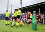 28 June 2025; Match officials and players enter the pitch before the FAI Women's Under-17 Cup final match between Athenry FC and Callan United at Fairview Rangers AFC in Limerick. Photo by Thomas Flinkow/Sportsfile