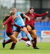 28 June 2025; Chloe Teehan of Callan United in action against Athenry FC players, from left, Anna Jordan and Cadhla Fox during the FAI Women's Under-17 Cup final match between Athenry FC and Callan United at Fairview Rangers AFC in Limerick. Photo by Thomas Flinkow/Sportsfile