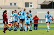 28 June 2025; Chloe Tennyson of Callan United, obstructed, celebrates with teammates after scoring her side's first goal during the FAI Women's Under-17 Cup final match between Athenry FC and Callan United at Fairview Rangers AFC in Limerick. Photo by Thomas Flinkow/Sportsfile