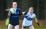 28 June 2025; Brinan O'Sullivan of New York in action against Grace McVey of Ballinderry Shamrocks during the LGFA Division 1 match between New York and Ballinderry Shamrocks at the John West Féile Peile na nÓg Gaelic Football and LGFA National Finals at Derry GAA Centre of Excellence in Owenbeg, Derry. Photo by Shauna Clinton/Sportsfile