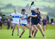 28 June 2025; Clodagh McCrytsal of Ballinderry Shamrocks in action against Fiona Henry of New York during the LGFA Division 1 match between New York and Ballinderry Shamrocks at the John West Féile Peile na nÓg Gaelic Football and LGFA National Finals at Derry GAA Centre of Excellence in Owenbeg, Derry. Photo by Shauna Clinton/Sportsfile