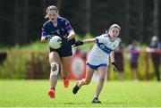 28 June 2025; Shayna Nolan of New York in action against Grace McVey of Ballinderry Shamrocks during the LGFA Division 1 match between New York and Ballinderry Shamrocks at the John West Féile Peile na nÓg Gaelic Football and LGFA National Finals at Derry GAA Centre of Excellence in Owenbeg, Derry. Photo by Shauna Clinton/Sportsfile