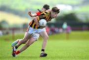 28 June 2025; Aaron Mulryan of Naomh Mearnóg in action against Teegan Heneghan of Ballytubber during the Football Division 1 match between Ballytubber and Naomh Mearnóg at the John West Féile Peile na nÓg Gaelic Football and LGFA National Finals at Derry GAA Centre of Excellence in Owenbeg, Derry. Photo by Shauna Clinton/Sportsfile
