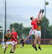 28 June 2025; Aaron Mulryan of Naomh Mearnóg in action against Oscar Diffley of Ballytubber during the Football Division 1 match between Ballytubber and Naomh Mearnóg at the John West Féile Peile na nÓg Gaelic Football and LGFA National Finals at Derry GAA Centre of Excellence in Owenbeg, Derry. Photo by Shauna Clinton/Sportsfile