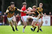 28 June 2025; Cillian Donnelly of Ballytubber in action against Cian Leavy, left, and Aaron Mulryan of Naomh Mearnóg during the Football Division 1 match between Ballytubber and Naomh Mearnóg at the John West Féile Peile na nÓg Gaelic Football and LGFA National Finals at Derry GAA Centre of Excellence in Owenbeg, Derry. Photo by Shauna Clinton/Sportsfile
