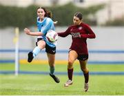 28 June 2025; Ona Kennedy of Callan United in action against Lily May Feeney of Athenry FC during the FAI Women's Under-17 Cup final match between Athenry FC and Callan United at Fairview Rangers AFC in Limerick. Photo by Thomas Flinkow/Sportsfile