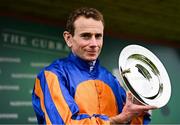 28 June 2025; Jockey Ryan Moore with the trophy after riding Whirl to victory in the Paddy Power Pretty Polly Stakes during day two of the Dubai Duty Free Irish Derby Festival at The Curragh Racecourse in Kildare. Photo by Seb Daly/Sportsfile