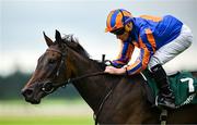 28 June 2025; Jockey Ryan Moore and mount Whirl after winning the Paddy Power Pretty Polly Stakes during day two of the Dubai Duty Free Irish Derby Festival at The Curragh Racecourse in Kildare. Photo by Seb Daly/Sportsfile
