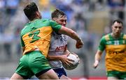 28 June 2025; Andrew Woods of Monaghan in action against Brendan McCole of Donegal during the GAA Football All-Ireland Senior Championship quarter-final match between Monaghan and Donegal at Croke Park in Dublin. Photo by Piaras Ó Mídheach/Sportsfile