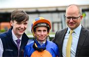 28 June 2025; Jockey Ryan Moore with MV Magnier, right, and groom Killian Murphy after winning the Paddy Power Pretty Polly Stakes during day two of the Dubai Duty Free Irish Derby Festival at The Curragh Racecourse in Kildare. Photo by Seb Daly/Sportsfile