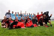 28 June 2025; Callan United players and supporters celebrate with the cup after the FAI Women's Under-17 Cup final match between Athenry FC and Callan United at Fairview Rangers AFC in Limerick. Photo by Thomas Flinkow/Sportsfile