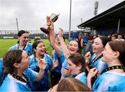 28 June 2025; Callan United players celebrate with the cup after the FAI Women's Under-17 Cup final match between Athenry FC and Callan United at Fairview Rangers AFC in Limerick. Photo by Thomas Flinkow/Sportsfile