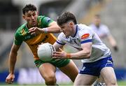 28 June 2025; Stephen O'Hanlon of Monaghan in action against Michael Langan of Donegal during the GAA Football All-Ireland Senior Championship quarter-final match between Monaghan and Donegal at Croke Park in Dublin. Photo by Piaras Ó Mídheach/Sportsfile