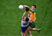 28 June 2025; Michael Langan of Donegal in action against Mícheal McCarville of Monaghan during the GAA Football All-Ireland Senior Championship quarter-final match between Monaghan and Donegal at Croke Park in Dublin. Photo by Daire Brennan/Sportsfile