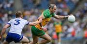 28 June 2025; Michael Murphy of Donegal in action against Kieran Duffy of Monaghan during the GAA Football All-Ireland Senior Championship quarter-final match between Monaghan and Donegal at Croke Park in Dublin. Photo by Ray McManus/Sportsfile