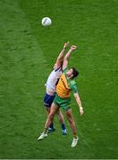 28 June 2025; Andrew Woods of Monaghan in action against Brendan McCole of Donegal during the GAA Football All-Ireland Senior Championship quarter-final match between Monaghan and Donegal at Croke Park in Dublin. Photo by Daire Brennan/Sportsfile